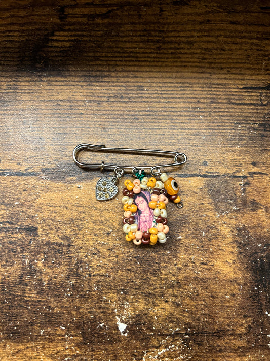 Pin de mal de ojito